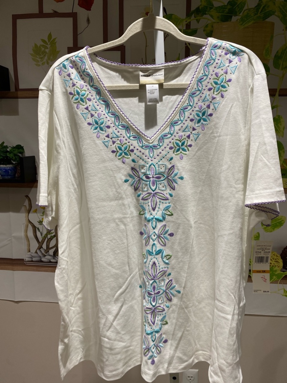 Alfred Dunner White Tunic Top with Teal & Lilac Embroidery 3 X. Ptp is 27.